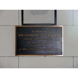 Father Pooley plaque